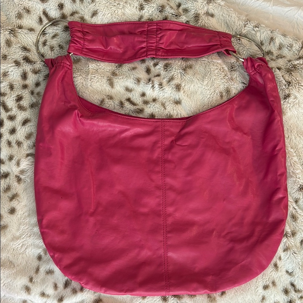 Vibrant Pink Hobo Bag with Knotted Strap and Silver hoop accents